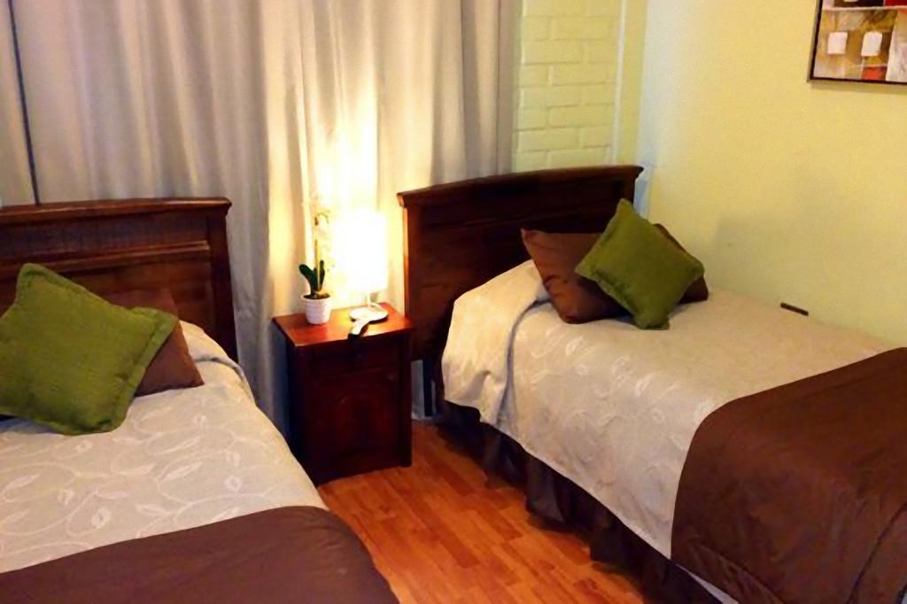 Hotel Almenas Сантьяго Номер фото